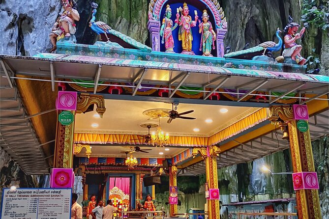 Batu Caves and Sari Experience with Batik Workshop - Climbing the Batu Caves steps