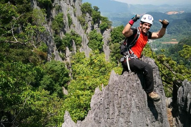 Climb and Abseiling Hidden Pinnacles of Takun - Abseiling down from the rocks