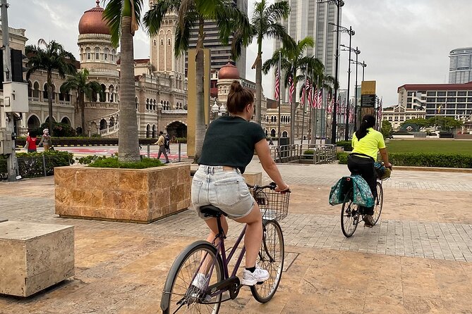 Cycling Through the Heart of Kuala Lumpur with Hotel Pickup - Merdeka Square begins the city lesson