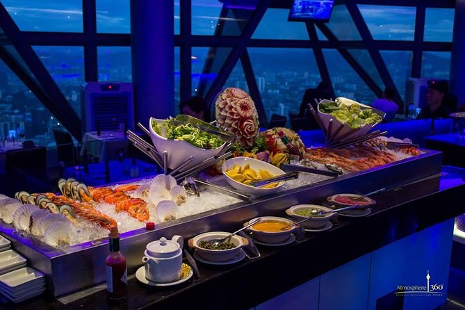 Dine-in at Orbit Revolving restaurant Kuala Lumpur(with transfer) - What happens from pickup at 6:30 pm