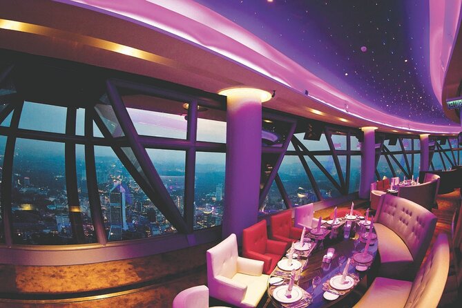 Dining at ORBIT Revolving Restaurant KL Tower with Transfers - Entering the restaurant and getting seated