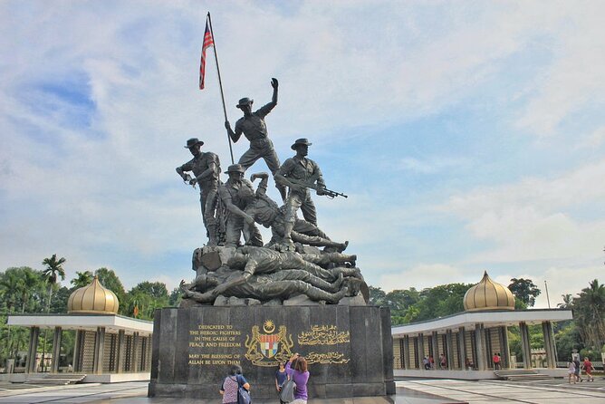 From Port Klang Petronas Twin Tower Batu Caves & KL City Tour - National Monument and Istana Negara