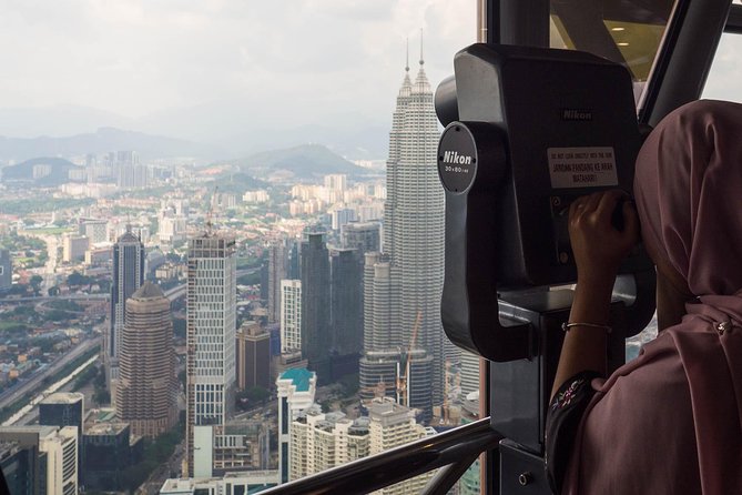 KL Tower Admission Ticket with One-Way Or Return Transfer - How the $69 price works for different visitors