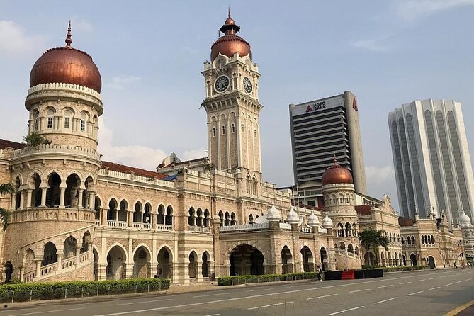 Kuala Lumpur City & Batu Caves Temple Private Tour - Batu Caves and the golden statue