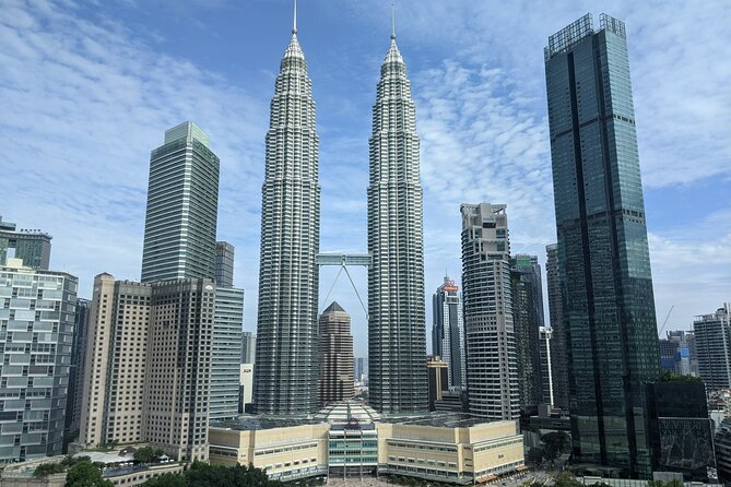 Kuala Lumpur City Tour with Petronas Twin Tower Admission Ticket - A private car and a fast look at central KL
