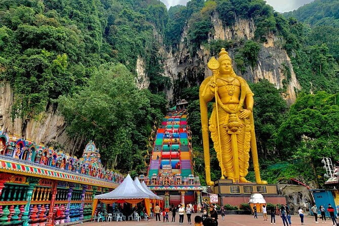 Private Batu Caves & Petronas Twin Tower Tickets With Lunch <em>26</em> – Key points to know before booking’ /></p>
<ul>
<li><strong>Batu Caves includes 272 steep steps</strong>, so a moderate level of fitness is needed.</li>
<li><strong>The private vehicle and guide keep the day simple</strong>, especially when several stops are spread across Kuala Lumpur.</li>
<li><strong>The Petronas Twin Towers visit is the main ticketed highlight</strong>, with access intended for the Skybridge and observation deck.</li>
<li><strong>Batik Chong and Royal Selangor add local craft context</strong>, but both stops may also include a retail element.</li>
<li><strong>A local lunch at Central Market is included</strong>, though the specific restaurant and menu are not given.</li>
<li><strong>Petronas tickets are subject to availability</strong>, with KL Tower offered instead for some last-minute bookings.</li>
</ul>
<h2>Batu Caves and the Petronas Towers in one half-day</h2>
<p>26</em> – Batu Caves and the Petronas Towers in one half-day’ /></p>
<p><p>This private tour is built around two very different Kuala Lumpur icons. Batu Caves is a religious site in a limestone hill, with shrines, Hindu deities, and a huge golden statue of Lord Murugan greeting you at the foot of the stairs.</p>
</p>
<p><p>The Petronas Twin Towers offer the city’s modern counterpoint. Their Skybridge and observation deck provide the high view, while the towers themselves show how Kuala Lumpur presents its modern identity to the world.</p>
</p>
<p><p>That pairing makes sense for a first visit. You get religion, craft, food, industry, and architecture in one outing. You also avoid arranging separate rides between each stop, which matters in a city where a short-looking route can take much longer in traffic.</p>
</p>
<p><p>The experience lasts about five to six hours. Since it is private, only your own group takes part. That gives you more control than a large coach excursion, although the schedule still has several fixed pieces: Batu Caves for two hours, batik for 30 minutes, Royal Selangor for an hour, Central Market for lunch, and the towers for about an hour.</p>
</p>
<div class="twil" style="margin: 20px 0; padding: 15px 0;"><p>More ways to do Batu Caves:</p><ul style="margin: 10px 0; padding-left: 0; list-style: none;"><li style="margin: 0 0 12px 0; padding: 0 0 12px 0; border-bottom: 1px solid #DDEBE8; line-height: 1.4;"><a href="https://tourkualalumpur.com/kuala-lumpur-batu-caves-half-day-tour-with-pick-up-option/">Kuala Lumpur: Batu Caves Half-Day Tour with Pick-Up Option</a><br><span style="font-size: 0.82em; color: #555;"><span style="color: #0C6E5A;">★</span> 4.5 &nbsp;&middot;&nbsp; 4,288 reviews</span></li><li style="margin: 0 0 12px 0; padding: 0 0 12px 0; border-bottom: 1px solid #DDEBE8; line-height: 1.4;"><a href="https://tourkualalumpur.com/private-half-day-batu-caves-and-cutural-tour-in-kuala-lumpur/">Private Half-Day Batu Caves and Cutural Tour in Kuala Lumpur</a><br><span style="font-size: 0.82em; color: #555;"><span style="color: #0C6E5A;">★</span> 5.0 &nbsp;&middot;&nbsp; 3,107 reviews</span></li><li style="margin: 0; padding: 0; border-bottom: none; line-height: 1.4;"><a href="https://tourkualalumpur.com/from-kuala-lumpur-batu-caves-cultural-temple-tour/">From Kuala Lumpur: Batu Caves Cultural Temple Tour</a><br><span style="font-size: 0.82em; color: #555;"><span style="color: #0C6E5A;">★</span> 4.7 &nbsp;&middot;&nbsp; 1,453 reviews</span></li></ul></div><h2>Climbing the 272 steps at Batu Caves</h2>
<p><img width="668" height="446" decoding="async" src=