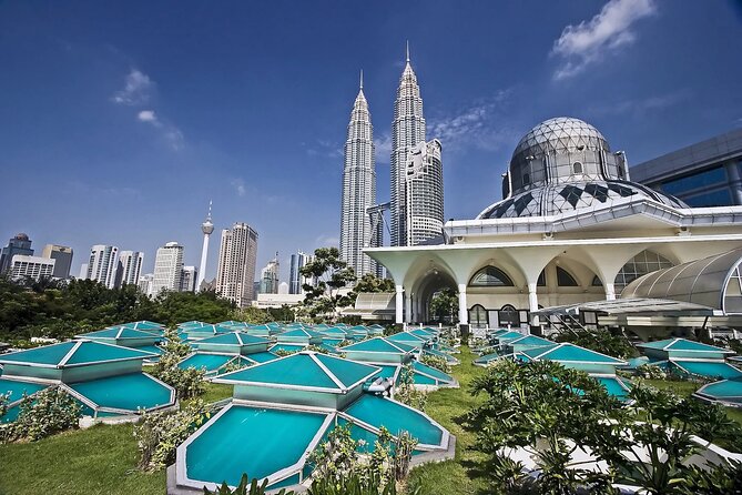 Private FullDay Tour includes Petronas Twin Towers & Batu Caves - Chinatown and Central Market for a quick taste of old Kuala Lumpur