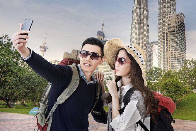 Private Half-Day Kuala Lumpur City Exploration Tour - Petronas Twin Towers: Kuala Lumpur’s signature view