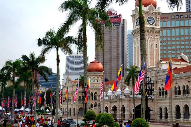 Private Kuala Lumpur City Tour With Petronas Tower & Local Dinner - Dinner and a cultural show at Wow KL Theatre
