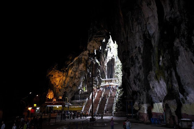 The holy caverns and temples of the Batu Caves - Batu Caves and the golden Murugan statue